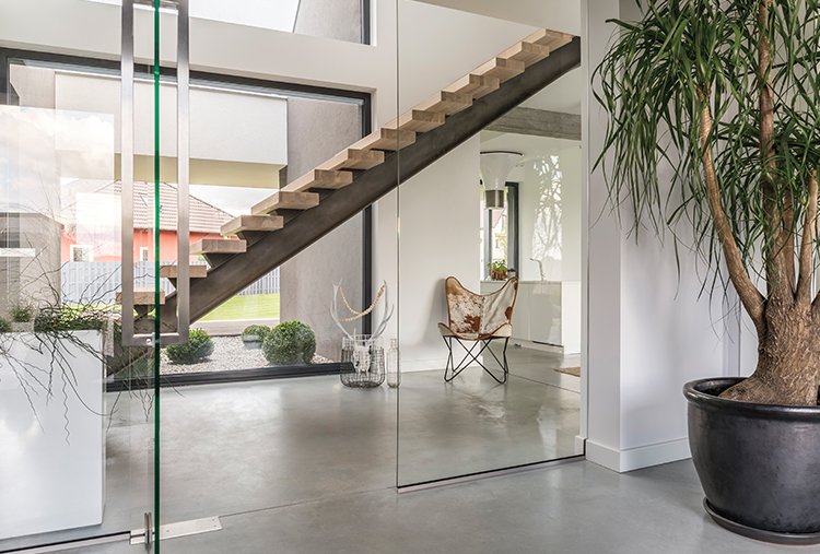 stairs made of concrete going to second level of house